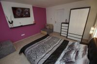 Posteľ alebo postele v izbe v ubytovaní Regina Delux Apartman