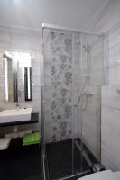 Kúpeľňa v ubytovaní Regina Delux Apartman