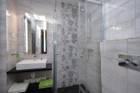 Kúpeľňa v ubytovaní Regina Delux Apartman