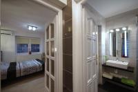 Posteľ alebo postele v izbe v ubytovaní Regina Delux Apartman
