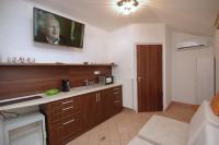 Kuchyňa alebo kuchynka v ubytovaní Regina Delux Apartman