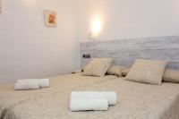 Posteľ alebo postele v izbe v ubytovaní Bungalows Sa Sargantana