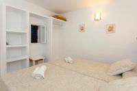 Posteľ alebo postele v izbe v ubytovaní Bungalows Sa Sargantana