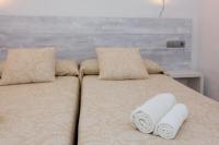 Posteľ alebo postele v izbe v ubytovaní Bungalows Sa Sargantana