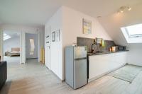 Kuchyňa alebo kuchynka v ubytovaní Apartament Rodzinny Mountain Aparts