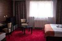 Postel nebo postele na pokoji v ubytování Hotel Slavie