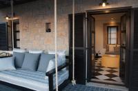 A seating area at Polismata - Private Residences