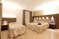 Posteľ alebo postele v izbe v ubytovaní Grand Hotel Miramonti
