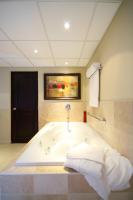 Postel nebo postele na pokoji v ubytování Presidential Suites by Lifestyle Puerto Plata - All Inclusive
