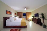 Postel nebo postele na pokoji v ubytování Presidential Suites by Lifestyle Puerto Plata - All Inclusive