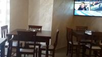 A television and/or entertainment centre at Daphnae House