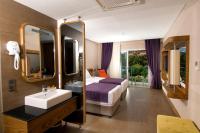 A bed or beds in a room at Casa De Maris Spa & Resort Hotel Adult Only 16 Plus