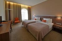 Postel nebo postele na pokoji v ubytování Hotel Budweis