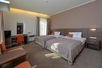 Postel nebo postele na pokoji v ubytování Hotel Budweis