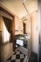 Posteľ alebo postele v izbe v ubytovaní Hotel Donatello