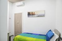 A bed or beds in a room at La Casa di Luna