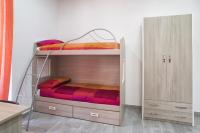 A bed or beds in a room at La Casa di Luna