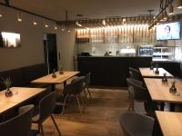 A restaurant or other place to eat at Gästehaus Brugger