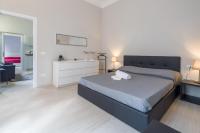 A bed or beds in a room at Beccaria Suite