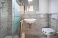 A bathroom at Beccaria Suite
