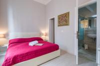 A bed or beds in a room at Beccaria Suite