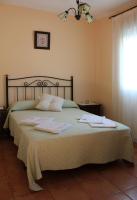 A bed or beds in a room at Casa Gil - La Vega