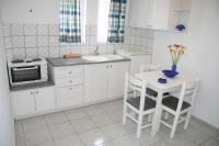 Kuchyňa alebo kuchynka v ubytovaní Litsa Mare Apartments