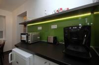 Kuchyňa alebo kuchynka v ubytovaní Regina Delux Apartman