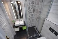 Kúpeľňa v ubytovaní Regina Delux Apartman