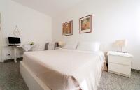 Posteľ alebo postele v izbe v ubytovaní B&B Magna Grecia di Gallitelli