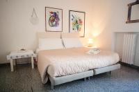 Posteľ alebo postele v izbe v ubytovaní B&B Magna Grecia di Gallitelli