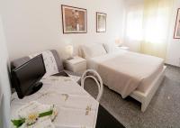 Televízia a/alebo spoločenská miestnosť v ubytovaní B&B Magna Grecia di Gallitelli