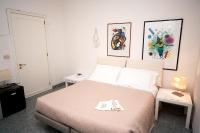 Posteľ alebo postele v izbe v ubytovaní B&B Magna Grecia di Gallitelli