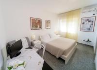 Posteľ alebo postele v izbe v ubytovaní B&B Magna Grecia di Gallitelli
