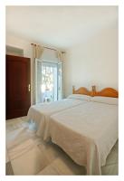 Postel nebo postele na pokoji v ubytování Hostal La Posada