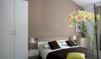 Łóżko lub łóżka w pokoju w obiekcie House Riviera