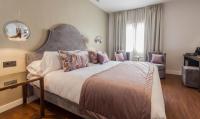 Postel nebo postele na pokoji v ubytování Hotel Palacete de Alamos