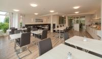 Kuchyň nebo kuchyňský kout v ubytování Hotel Chrisma