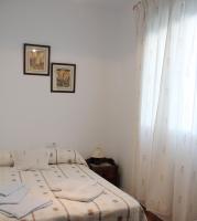 A bed or beds in a room at Casa Gil - La Vega