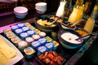 a table topped with lots of different types of food at Campanile Toulouse Sesquieres in Toulouse