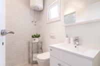 Kúpeľňa v ubytovaní Apartmani Sara i Klara