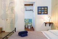 Posteľ alebo postele v izbe v ubytovaní Don Pedro Rooms Vicerè di Toledo in the city center