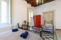 Posteľ alebo postele v izbe v ubytovaní Don Pedro Rooms Vicerè di Toledo in the city center