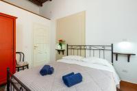 Posteľ alebo postele v izbe v ubytovaní Don Pedro Rooms Vicerè di Toledo in the city center