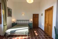 Łóżko lub łóżka w pokoju w obiekcie Hotel Villa Porta All'Arco