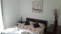 Postel nebo postele na pokoji v ubytování Apartments Toni