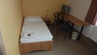 Postel nebo postele na pokoji v ubytování Hotel THT