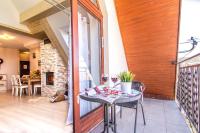 Patio alebo iná vonkajšia časť ubytovania Apartamenty Smrekowa Tatry Zakopane
