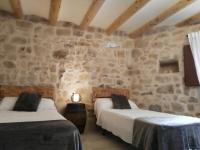 Postel nebo postele na pokoji v ubytování Casa Rural Santana