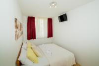 Posteľ alebo postele v izbe v ubytovaní Apartment Big Look